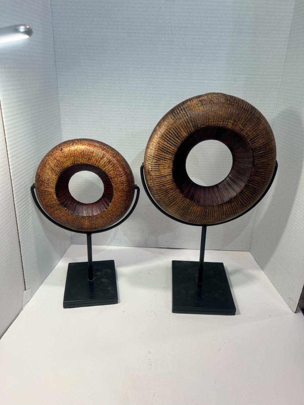 Set of Unlisted Bronze and Dark Brown Circular Ring Sculptures.